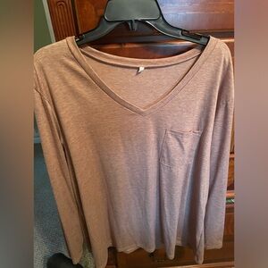 Tan long sleeved shirt with front pocket